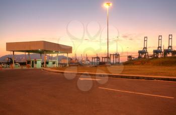 freight ship with working crane at dusk for Logistic Import Export background 