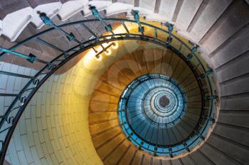 Spiral staircase inside the Eckmuhl lighthouse in Brittany, France