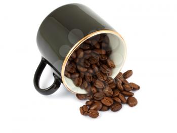Royalty Free Photo of a Coffee Mug with Coffee Beans Spilling Out