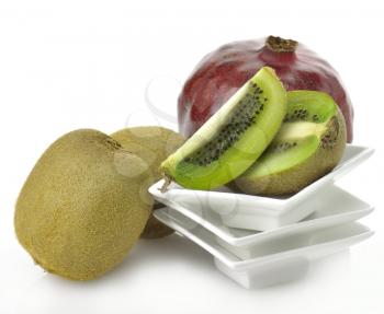 Royalty Free Photo of a Pomegranate and Kiwis