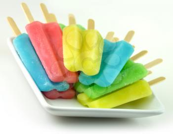 colorful ice cream pops on a white background 