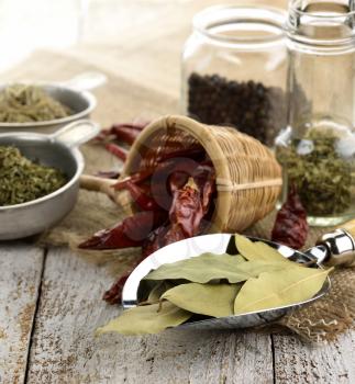 Spices And Herbs On A Wooden Table