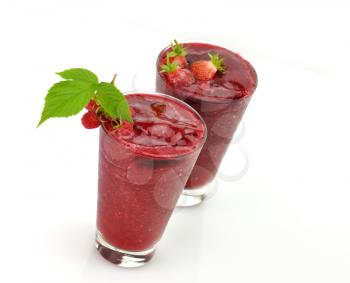 Frozen strawberry and raspberry smoothie with fresh  berries