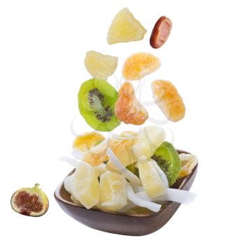 Healthy food: mix from dried fruits in bowl isolated on white