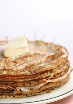 Stack of pancakes with butter 
