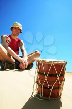 Royalty Free Photo of a Man and a Drum