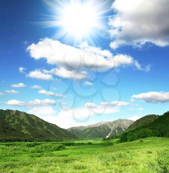 Royalty Free Photo of Mountains and Meadows
