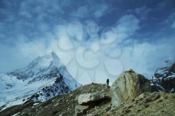 Royalty Free Photo of a Climber with Shivling Peak in the Background