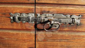 Royalty Free Photo of a Bolt on a Wooden Gate