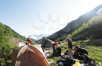 Royalty Free Photo of People Camping in the Mountains