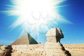 Royalty Free Photo of an Egyptian Pyramid and Sphinx