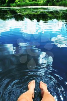 Royalty Free Photo of Feet in Water