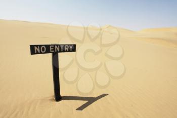 Royalty Free Photo of a No Entry Sign in the Desert