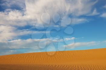 Unspoiled sand dunes in the remote desert