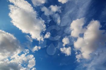 Sunny background, blue sky with white clouds, natural background.