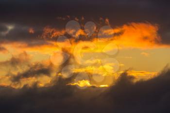 Unusual storm clouds at sunset.  Suitable for background.