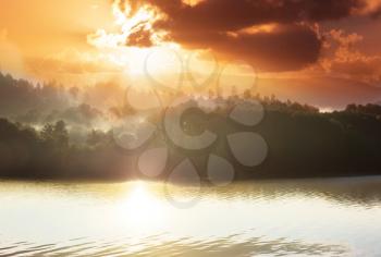 Sunrise scene on beautiful serene lake. Beautiful natural background