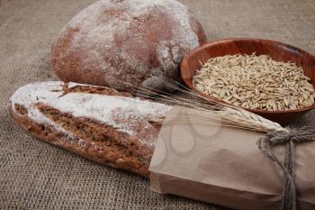 Brown different breads on sackcloth background