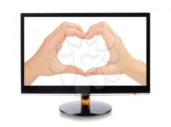 Hands forming a heart  in monitor isolated on white