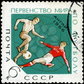 USSR - CIRCA 1966: A stamp printed in the USSR  shows a football players with the inscription and name of a series Football World Cup, England, 1966”, circa 1966
