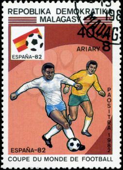 MALAGASY - CIRCA 1982: A post stamp printed in Malagasy shows shows football, series devoted World Cup in Spain, circa 1982.