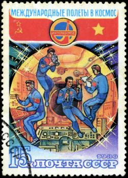 USSR-CIRCA 1980: A stamp printed in USSR, international flights into space, astronauts in space on Space Station are investigating, circa 1980