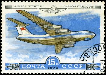USSR - CIRCA 1979: A Stamp printed in USSR shows the Aeroflot Emblem and aircraft with the inscription Airmail, Aircraft Il-76, from the series History of the Soviet aircraft industry, circa 1979