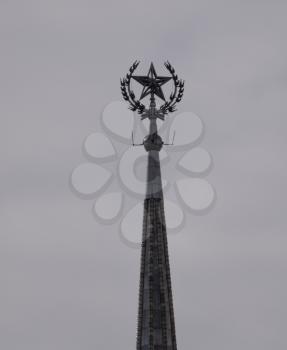 The spire of the hotel Ukraine against the sky in Moscow.