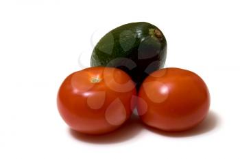 tomato and avocado isolated on white