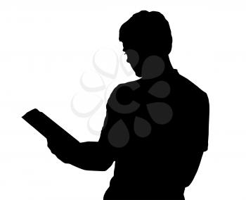 Profile portrait silhouette of standing teenage boy reading a book