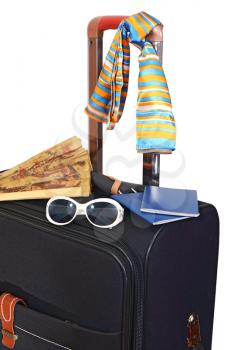 black suitcase trips and accessories for rest isolated on white background