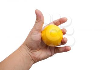 Lemon in a hand on a white background