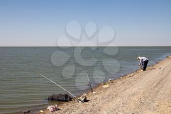 Fisherman fishing on the lake