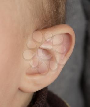 Little human child one listening silence ear macro