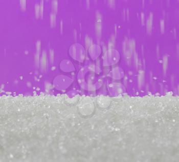 Sugar on a purple background. macro
