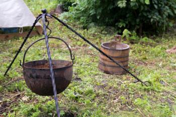 cauldron with a tripod outdoors