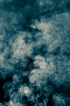 abstract background of blue smoke on a black background