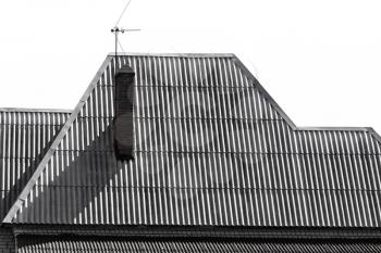 black and white photo of the roof of the house .
