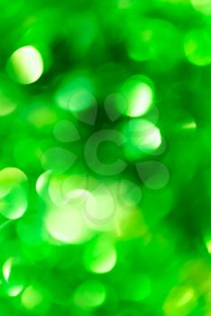 festive green bokeh as background