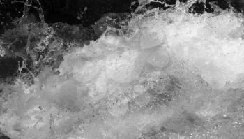 abstract background. rough water with splashes