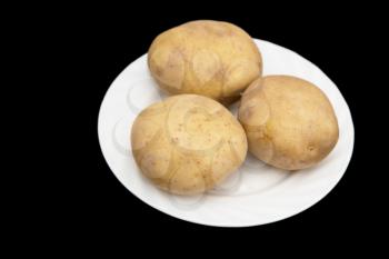 potatoes on a black background
