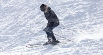 Athlete skiing in the snowy mountains