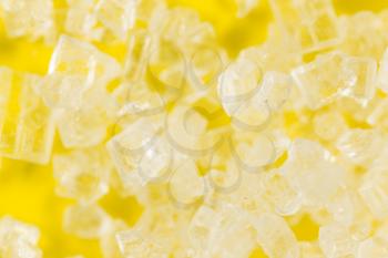 Sugar on a yellow background. super macro