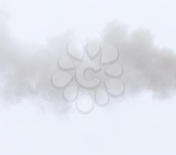 Smoke from a pipe on a cloudy sky