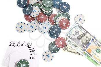 casino chips and cards and one hundred dollars on a white background