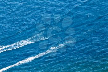 trace from a boat on the surface of the water