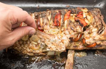 fried fish on a baking sheet