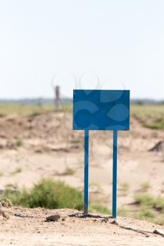 blue sign in the desert