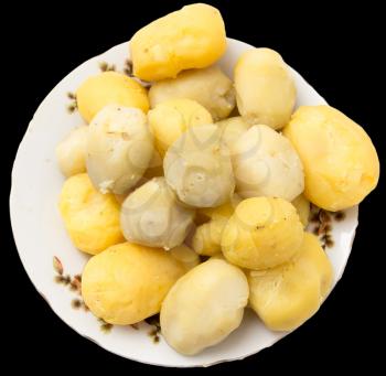 boiled potatoes on a black background