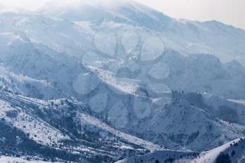 Snowy mountains of Tien Shan in winter .